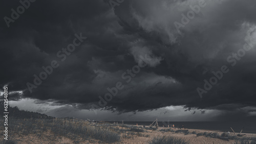 Storm approaching with dark blue clouds and lightning