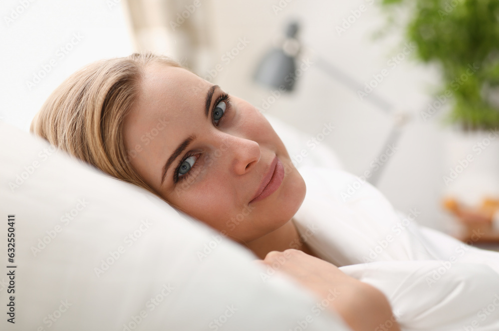 Young beautiful woman waking up in the morning concept Young beautiful woman waking up in the morning concept