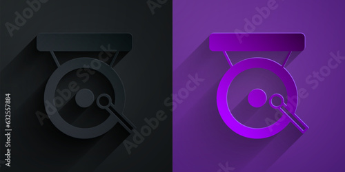 Paper cut Boxing gong icon isolated on black on purple background. Boxing bell. Paper art style. Vector