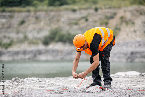 carrying out work in a quarry where minerals are extracted with the help of excavations, explosive works