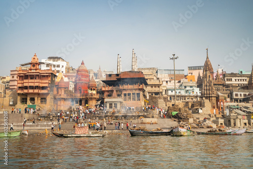 Varanasi, India : March 12 2023 - Manikarnika Ghat darshan (view) while having a boat ride on river Ganga
