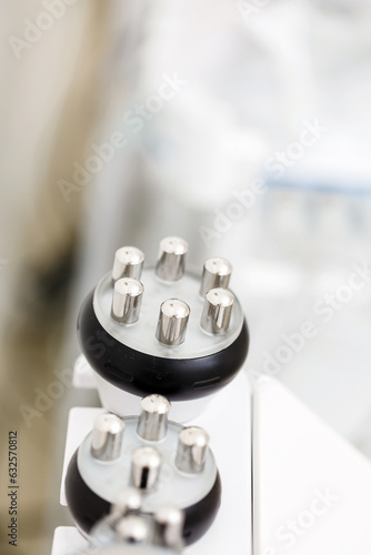 RF body cavitation lifting procedure in a beauty salon. Ultrasound therapy to reduce fat and elasticity of the skin. Cosmetic ultrasonic anti-cellulite massage close-up