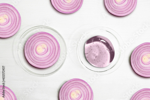 Onion Slices. Beauty treatments and body care with onion. Cream and onion pieces on a white background, beauty.