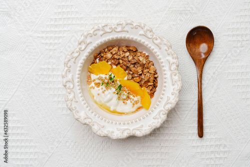 Bowls of oatmeal with mixed fruits topping