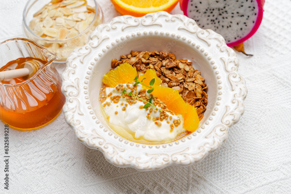 Bowls of oatmeal with mixed fruits topping