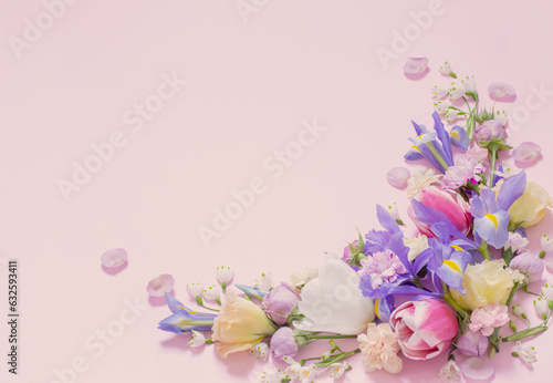 beautiful spring flowers on purple background