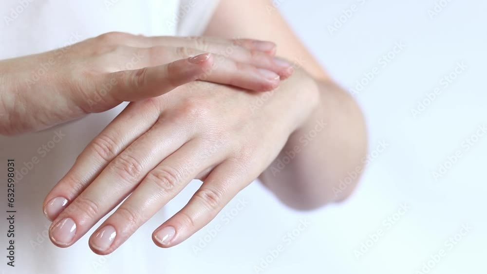 Hand cream. Apply hand cream to the skin with massage movements, close-up. Anti-aging cosmetics. Women's hand care Hand cream. Apply hand cream to the skin with massage movements, close-up. Anti-aging cosmetics. Women's hand care