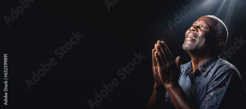 An elderly man of African ethnicity praying. Christian religious prayer and devotion banner with copy space. Generative AI illustration