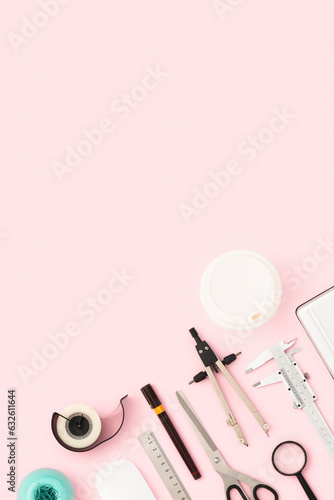 Back to school, stationary flat lay on pink background