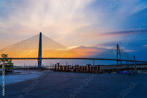 Shantou City  Guangdong Province  China. Chinese translation on the bridge Shantou Queshi bridge