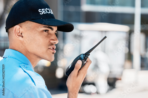 Security guard, walkie talkie and man in city in communication, surveillance and thinking. Safety, protection and serious officer on radio to chat on tech in police service, investigation and report