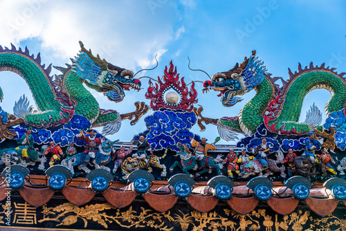 These figurines are placed on top of an old chinese taoist temple as part of the temple structural designs.