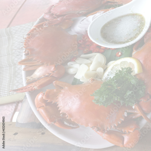 Blurred image of orange crab that is a Thai food.