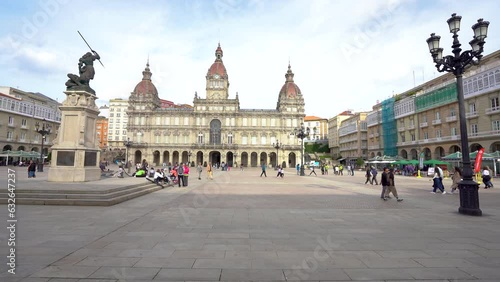 View of María Pita Square in city center of A Coruna. In background is the Town Hall Building. At left is Maria Pita Statue. Travel destination. Stabilized footage
