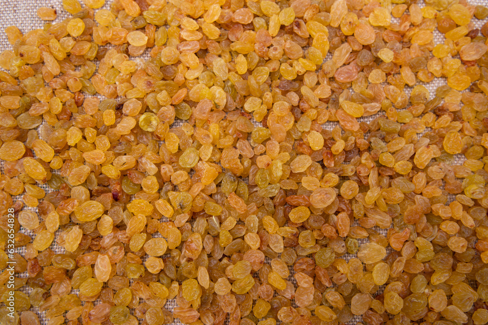 Dried fruits Yellow sweet delicious raisins pattern texture can be used as a background wallpaper Dried fruits Yellow sweet delicious raisins pattern texture can be used as a background wallpaper