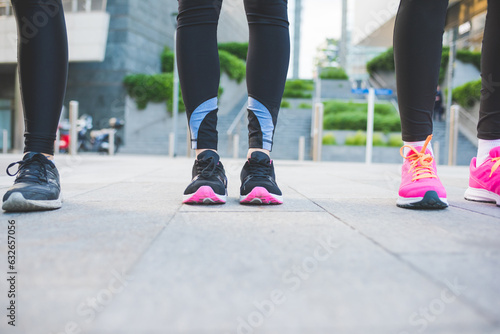Close up women wearing jogging and running shoes outdoors