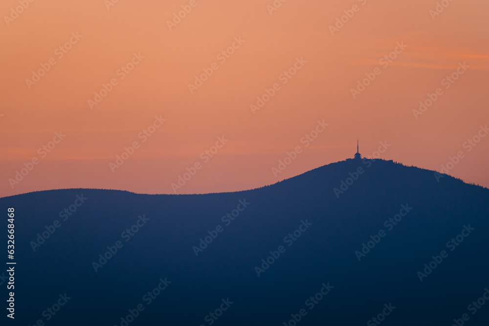 Radhost is a majestic peak in the Czech Republic Beskydy moutains, a popular pilgrimage site with stunning vistas and a historic statue of the pagan god Radegast. High quality illustration