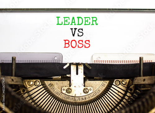 Boss vs leader symbol. Concept words Boss vs versus leader typed on beautiful retro old typewriter. Beautiful white background. Business motivational boss vs leader concept. Copy space.