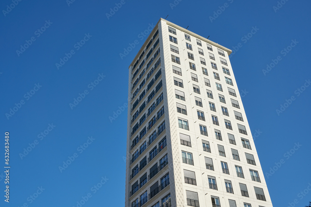 High and luxurious apartments with a summer blue sky on the background. High and luxurious apartments with a summer blue sky on the background.