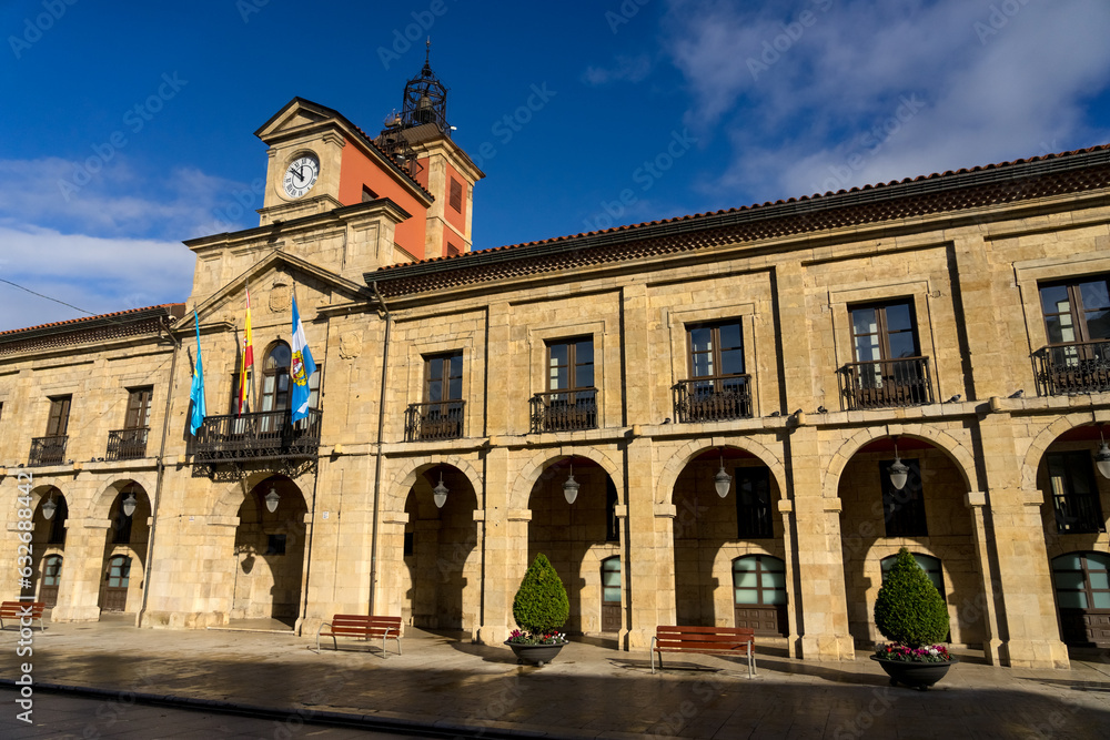 City Hall in the Spain square in the old town of the beautiful city of Aviles with its historic buildings with arcades, Asturias, Spain.