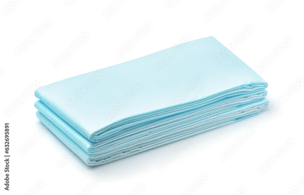 Stack of blue disposable non woven bed sheets Stack of blue disposable non woven bed sheets