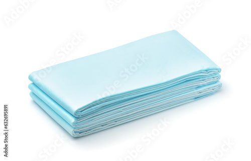 Stack of blue disposable non woven bed sheets