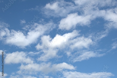 Blue sky with white clouds Clear blue sky with white fluffy clouds. Nature background