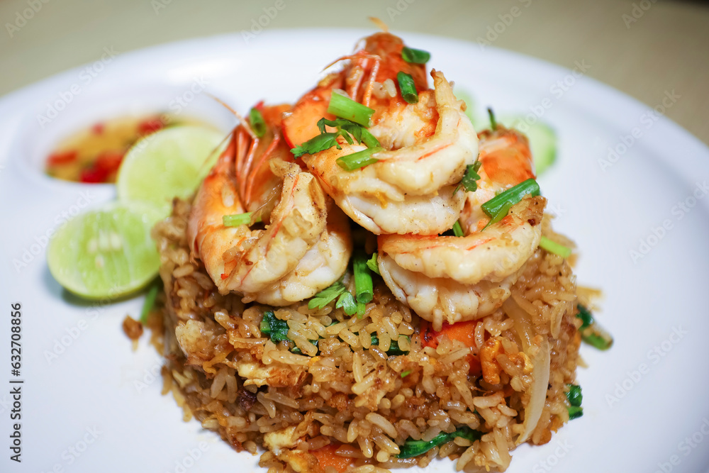 homemade fried shrimps fried rice on plate in Thai style - Asian food style homemade fried shrimps fried rice on plate in Thai style - Asian food style