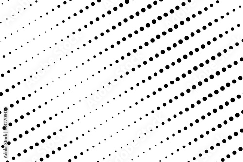 Pattern of inclined black dots of different sizes
