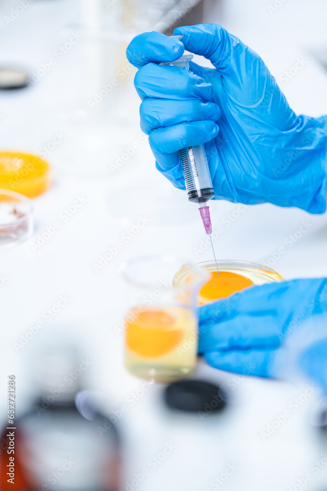 Scientist testing gmo egg for quality control of eggs in chemical laboratory, Food science expert inspecting a dairy product, Agriculture farm production industry, biotechnology medicine research Scientist testing gmo egg for quality control of eggs in chemical laboratory, Food science expert inspecting a dairy product, Agriculture farm production industry, biotechnology medicine research