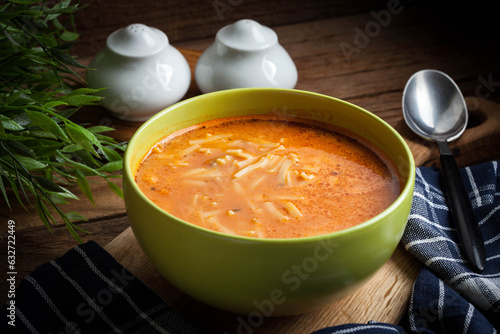 Fotografie Homemade tomato soup with noodles.