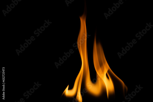 A bright orange, large flame that embers burn