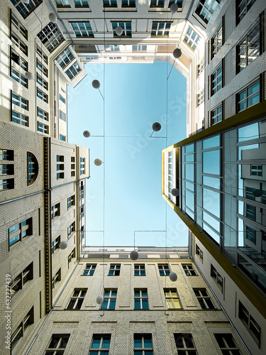 Low angle view courtyard of apartment block © A. Emson