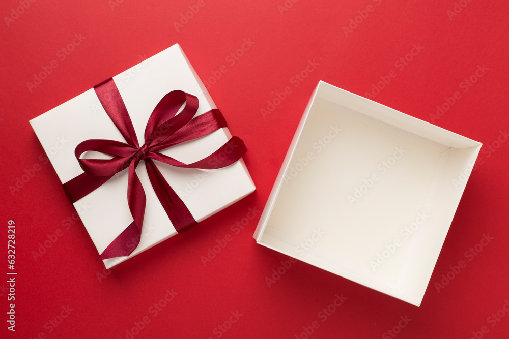 Open gift box on color background, top view. Mock up for design Open gift box on color background, top view. Mock up for design