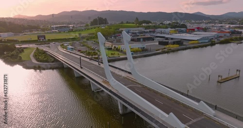 Aerial: Te Matau A Pohe Bridge crossing the Hatea River, Whangarei, New Zealand photo