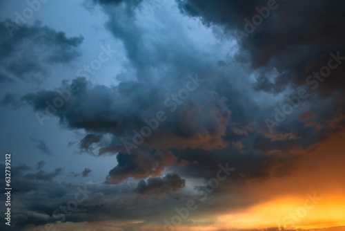 Nice evening stormy dramatic sunset sky with colorful clouds, nature and backgrounds © Serhii