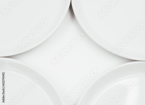 White round plate on white background copy space