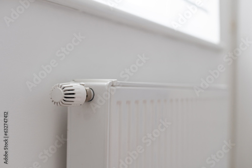 Wallpaper Mural A steel panel heating radiator is placed under the windowsill on a white wall. Torontodigital.ca