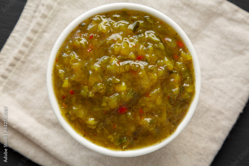 Homemade Sweet Pickle Relish in a Bowl, top view. Flat lay, overhead, from above. Homemade Sweet Pickle Relish in a Bowl, top view. Flat lay, overhead, from above.