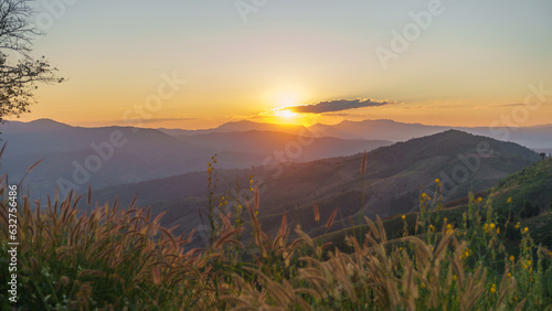 Beautiful sunrise scene in mountains with view of nature. © mojo_cp