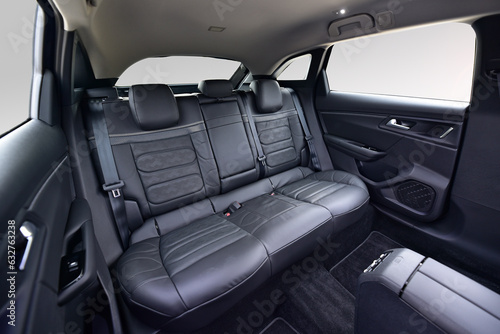 Car interior, black leather rear seat in the passenger car © algre