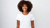 portrait of an attractive afro american female in her 30s with shoulder-length brown curly hair isolated against a white background