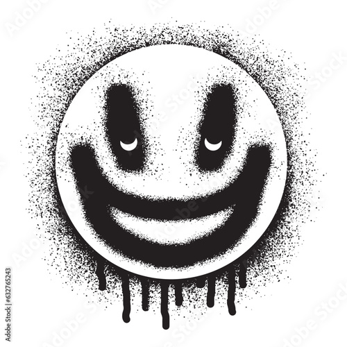 Smiling face emoticon graffiti with black spray paint 