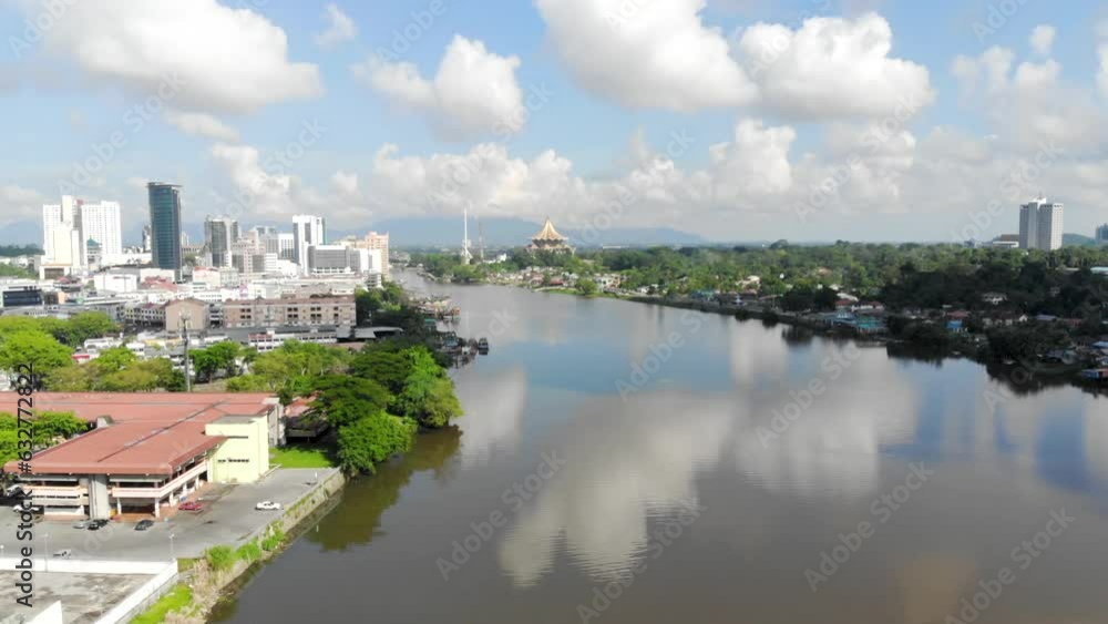 Aerial view of tall lavish buildings nearby greenery in Sarawak Malaysia Aerial view of tall lavish buildings nearby greenery in Sarawak Malaysia
