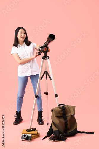 Young Asian tourist using t...