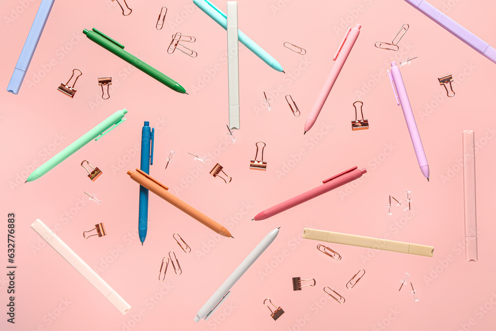 Different stationery flying on pink background Different stationery flying on pink background