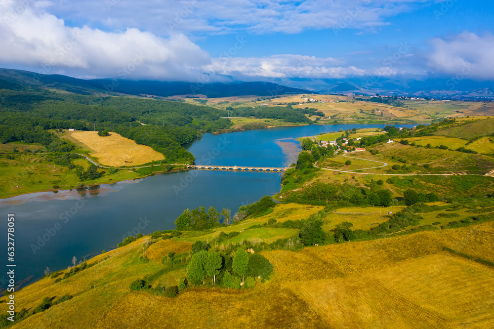 Panoramic scenic view of Ebro river, hills and fields near Campoo de Enmedio, Spain