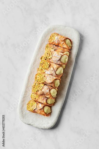 Cannoli with salted pistachio cream & toasted pistachios photo