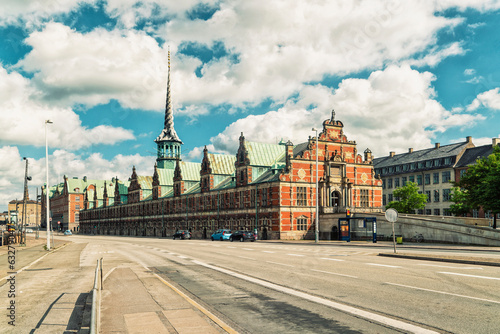 Photography waterfront building & former stock exchange in Copenhagen with a striking spire,