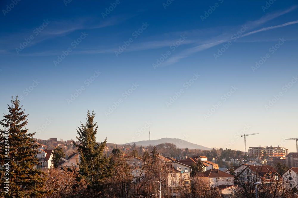 Panorama of Banjica district in Belgrade, in Vozdovac municipality, Serbia, with avala tower in background. Called avalski toranj, it's a landmark, attraction, television, radio & broadcasting antenna Panorama of Banjica district in Belgrade, in Vozdovac municipality, Serbia, with avala tower in background. Called avalski toranj, it's a landmark, attraction, television, radio & broadcasting antenna